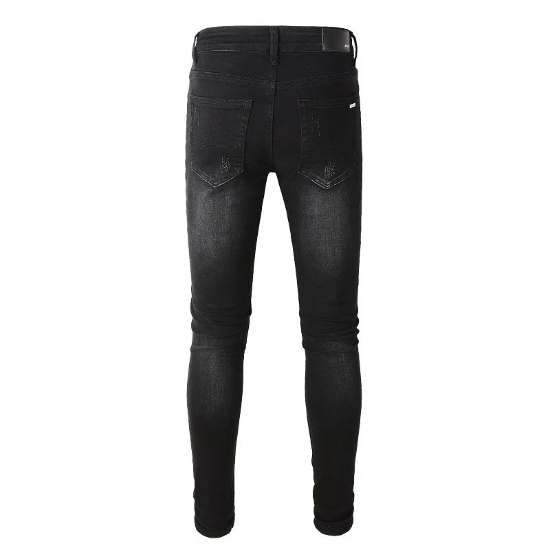 Amiri Jeans black slim fit straight-leg jeans ripped tie-dye