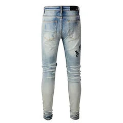 Amiri Jeans blue slim straight leg ripped jeans