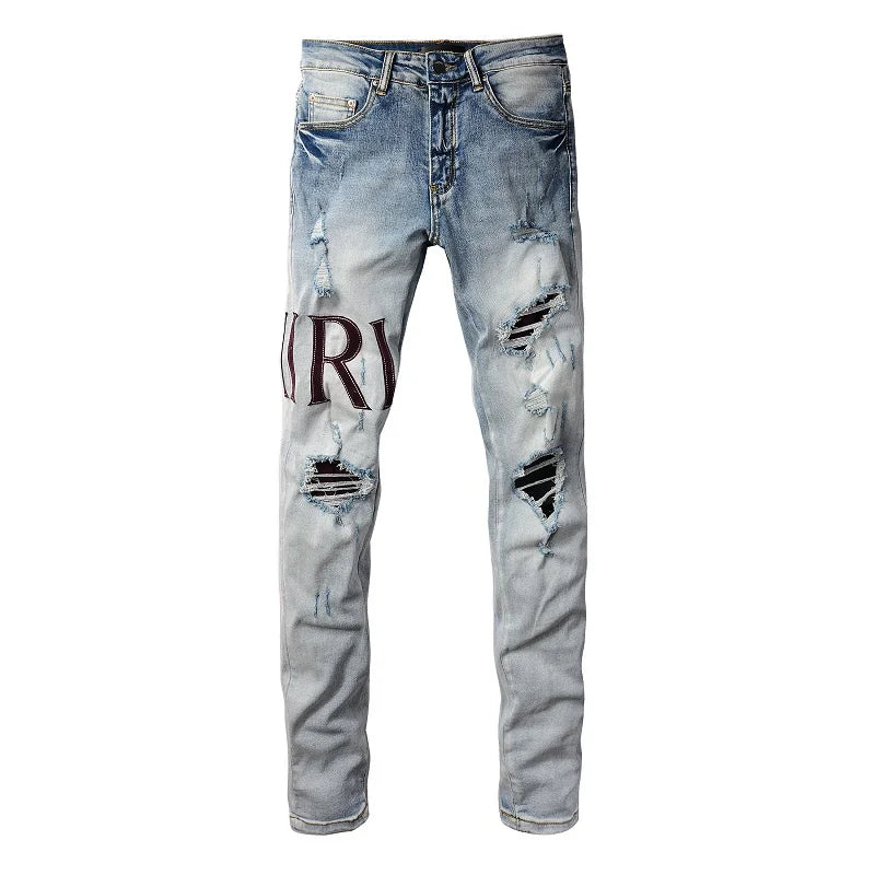 Amiri Jeans gray and black printed slim straight leg ripped jeans