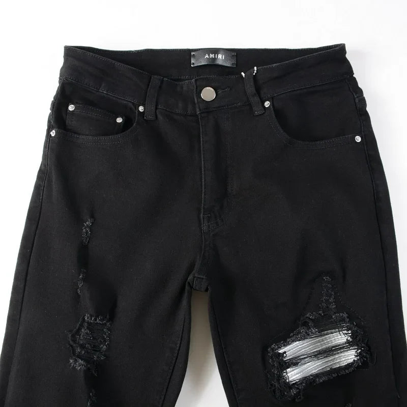 Amiri Jeans black slim straight leg ripped jeans