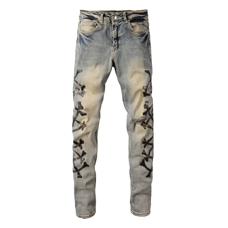 Amiri Jeans blue slim straight leg jeans with ripped print