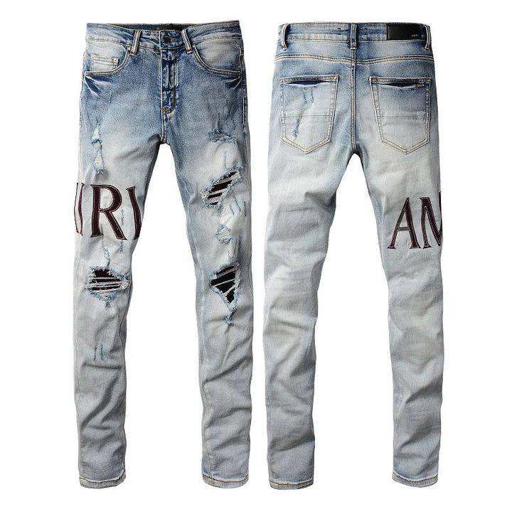 Amiri Jeans gray and black printed slim straight leg ripped jeans