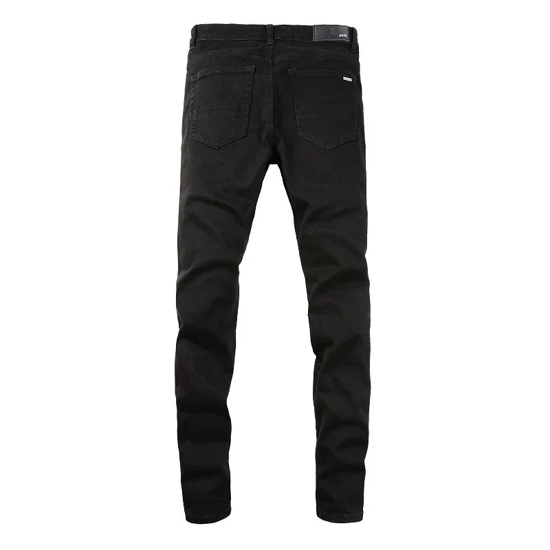 Amiri Jeans black slim straight leg ripped jeans