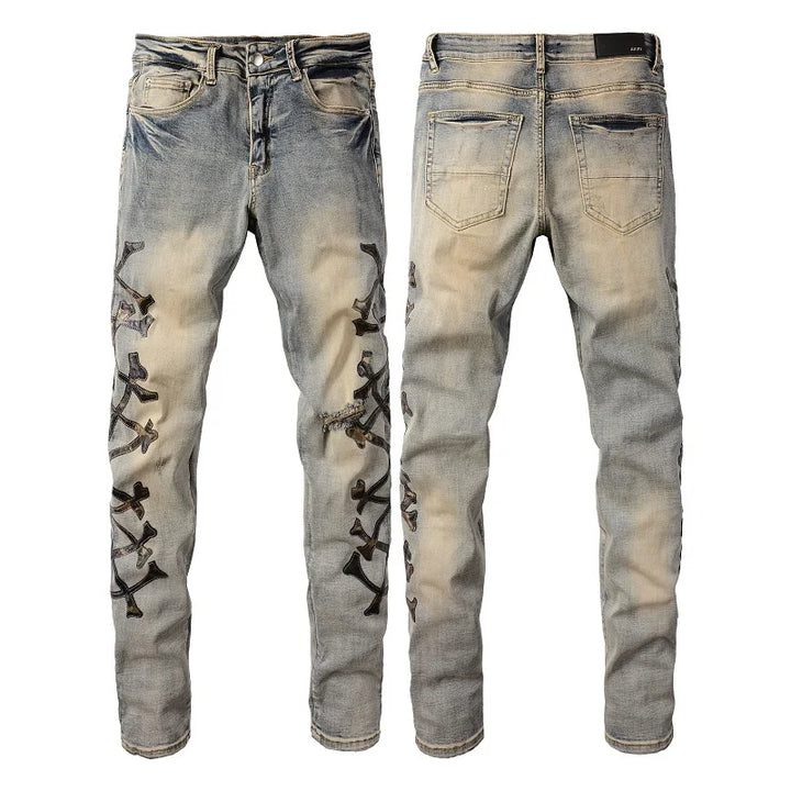 Amiri Jeans blue slim straight leg jeans with ripped print