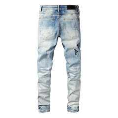 Amiri Jeans blue slim straight leg ripped jeans