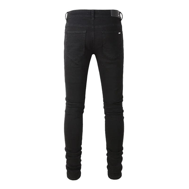 Amiri Jeans black slim straight leg ripped jeans