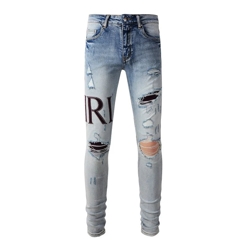 Amiri Jeans gray and black printed slim straight leg ripped jeans