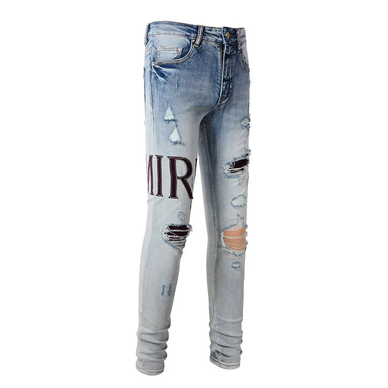 Amiri Jeans gray and black printed slim straight leg ripped jeans